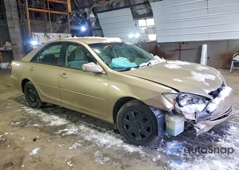 2002 Toyota Camry Le from USA, damaged, VIN 4T1BE32K22U005704